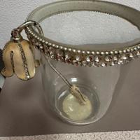 Vaso con spegnicandela