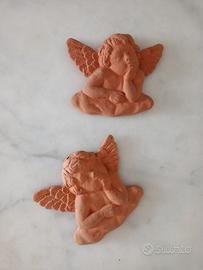 2 angioletti in terracotta di Enzo Soldani