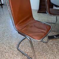 4 sedie a seduta sospesa in acciaio