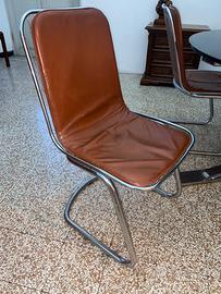 4 sedie a seduta sospesa in acciaio