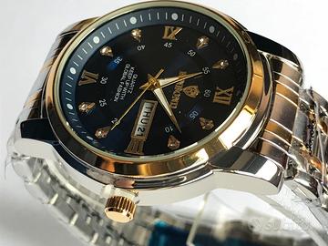 Fuori tutto Orologio polso nuovo con calendario.