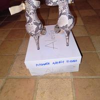 Scarpe aperte con tacco