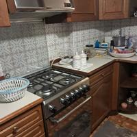 Cucina a gas con forno + cappa acciaio 