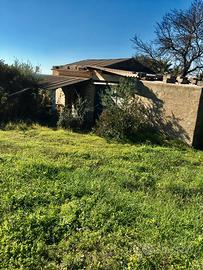 Terreno con annesso deposito