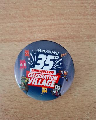 MediaWorld - Spilla celebrativa