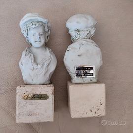 Coppia Statuine fanciulli in ceramica biscuit