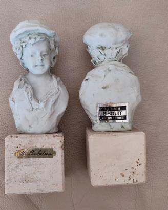 Coppia Statuine fanciulli in ceramica biscuit