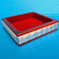 Vuotatasche in argento e legno