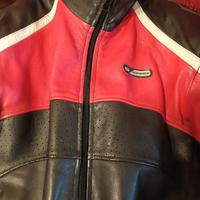 tuta giubbotto pelle moto