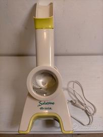 Tagliaverdure elettrico con lame acciaio Inox .