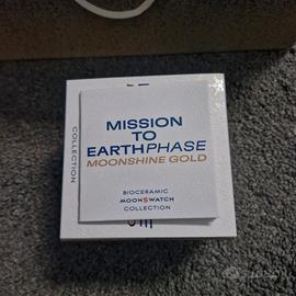 swatch Mission To Earthphase moonshine gold