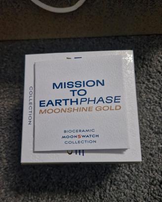 swatch Mission To Earthphase moonshine gold