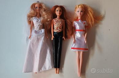 Lotto di tre bambole tipo Barbie 