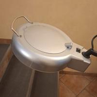 Lampada con lente d'ingrandimento
