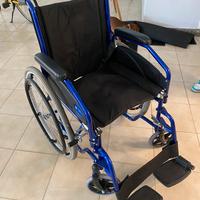 Sedia a rotelle, carrozzina