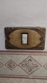 Placche  stile vintage in ottone