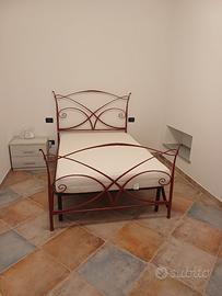 letto in ferro battuto con materasso in lattice