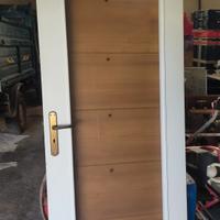 Porta centinata in legno bianco Mt 2,16 alta