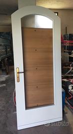 Porta centinata in legno bianco Mt 2,16 alta