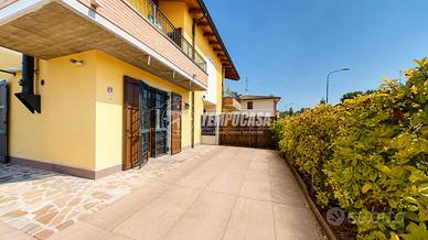 Maisonette con giardino privato su tre lati