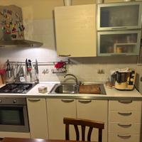 Cucina , lettini singoli e armadio