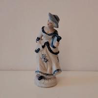 statuina in porcellana