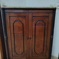 Angoliera italiana in masso di noce. Primi 900