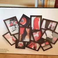 Cornice nera per 11 foto