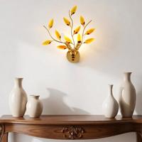 Applique Astree oro e cristalli