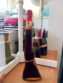 Bottiglia di liquore a forma di fucile