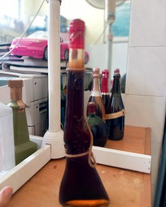 Bottiglia di liquore a forma di fucile