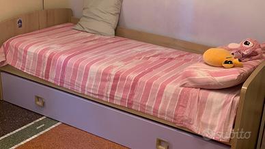 letto singolo con secondo letto e materassi