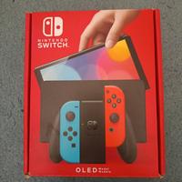 Nintendo Switch Oled  con 2 Joy-Con e 2 Giochi