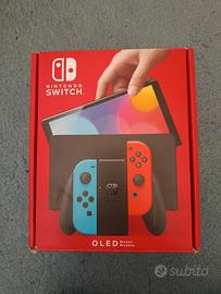 Nintendo Switch Oled  con 2 Joy-Con e 2 Giochi