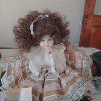 bambola ricciolona capelli castani