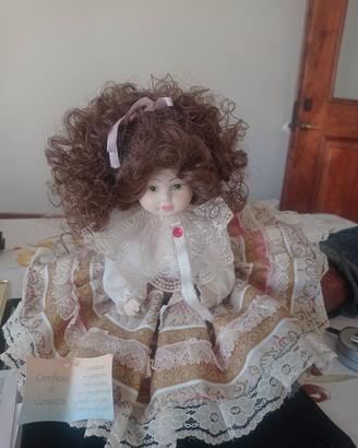 bambola ricciolona capelli castani