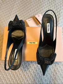 Tacchi Miu Miu