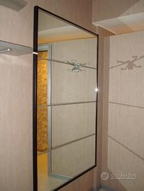 Composizione di specchi attrezzabili