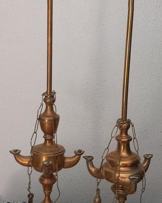 Coppia di lampade lucerne ad olio in bronzo