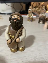 Uomo con sacca presepe thun