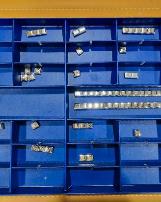 Bracciali NOMINATION con lettere in oro.