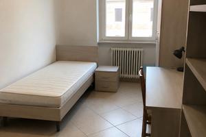 Stanza singola in zona ben collegata