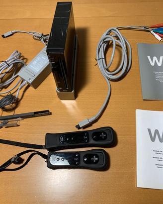 Nintendo Wii nera più accessori vari