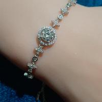 Braccialetto in argento, oro e moissanite