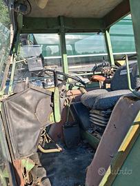 trattore  fend con braccio decespugliatore