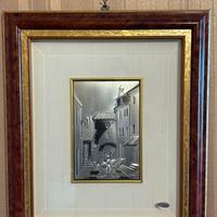 Questo è un quadro in argento a rilievo prodotto d