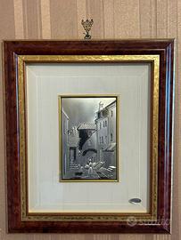 Questo è un quadro in argento a rilievo prodotto d