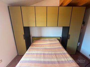 Armadio a ponte con struttura letto