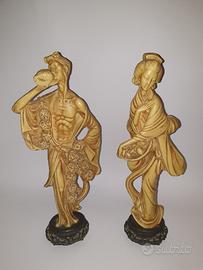 Coppia di statue orientali (pescatori cinesi)
