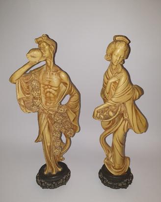Coppia di statue orientali (pescatori cinesi)